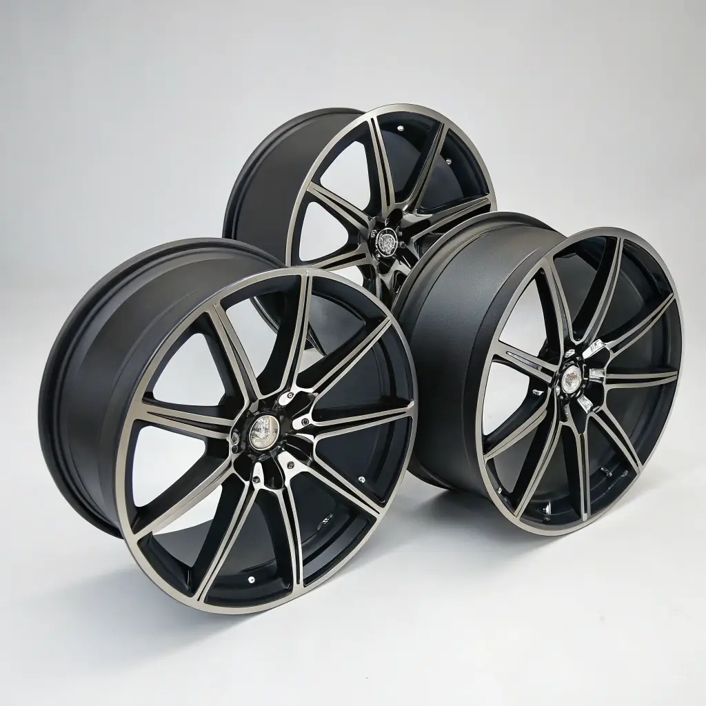 A set of matte black wheels with a multi-spoke design.